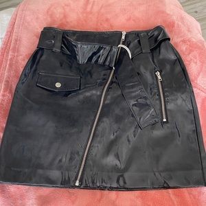 Black shiny medium mini skirt